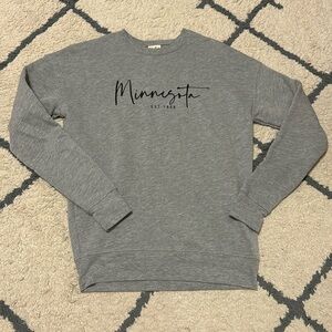 Gray Minnesota crew neck.   Size medium